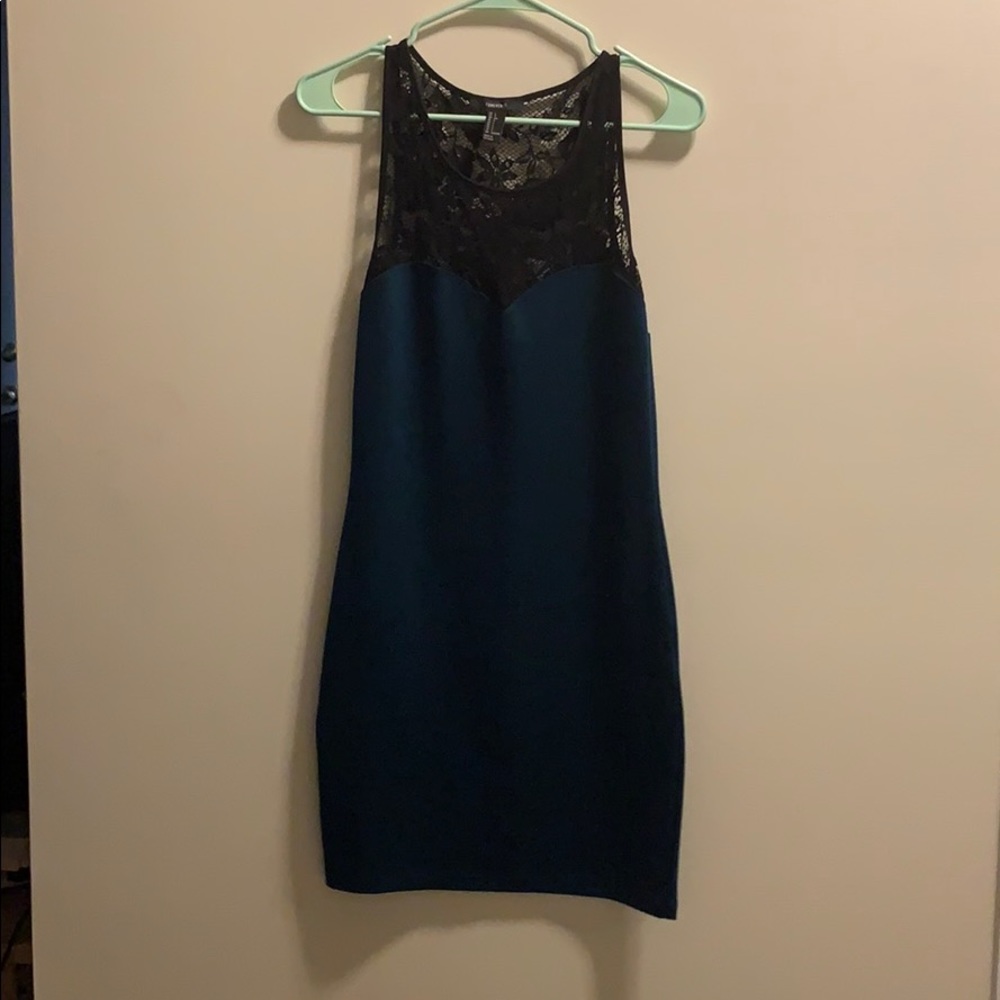 Green dress with black lace detail